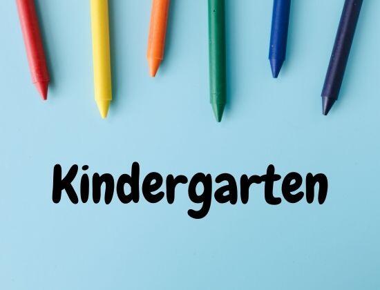 The word Kindergarten and some crayons